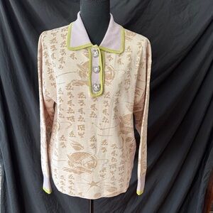 Mukzin Pan Asian Sweater